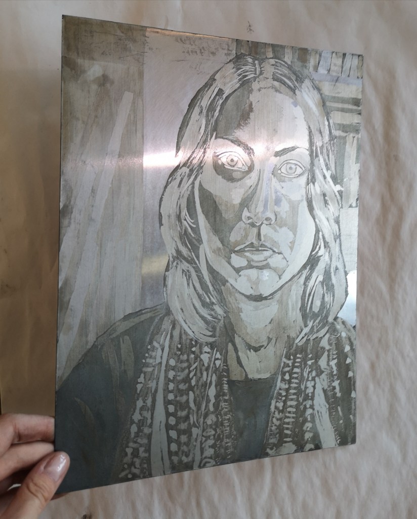 Metal plate etched with the aquatint technique 